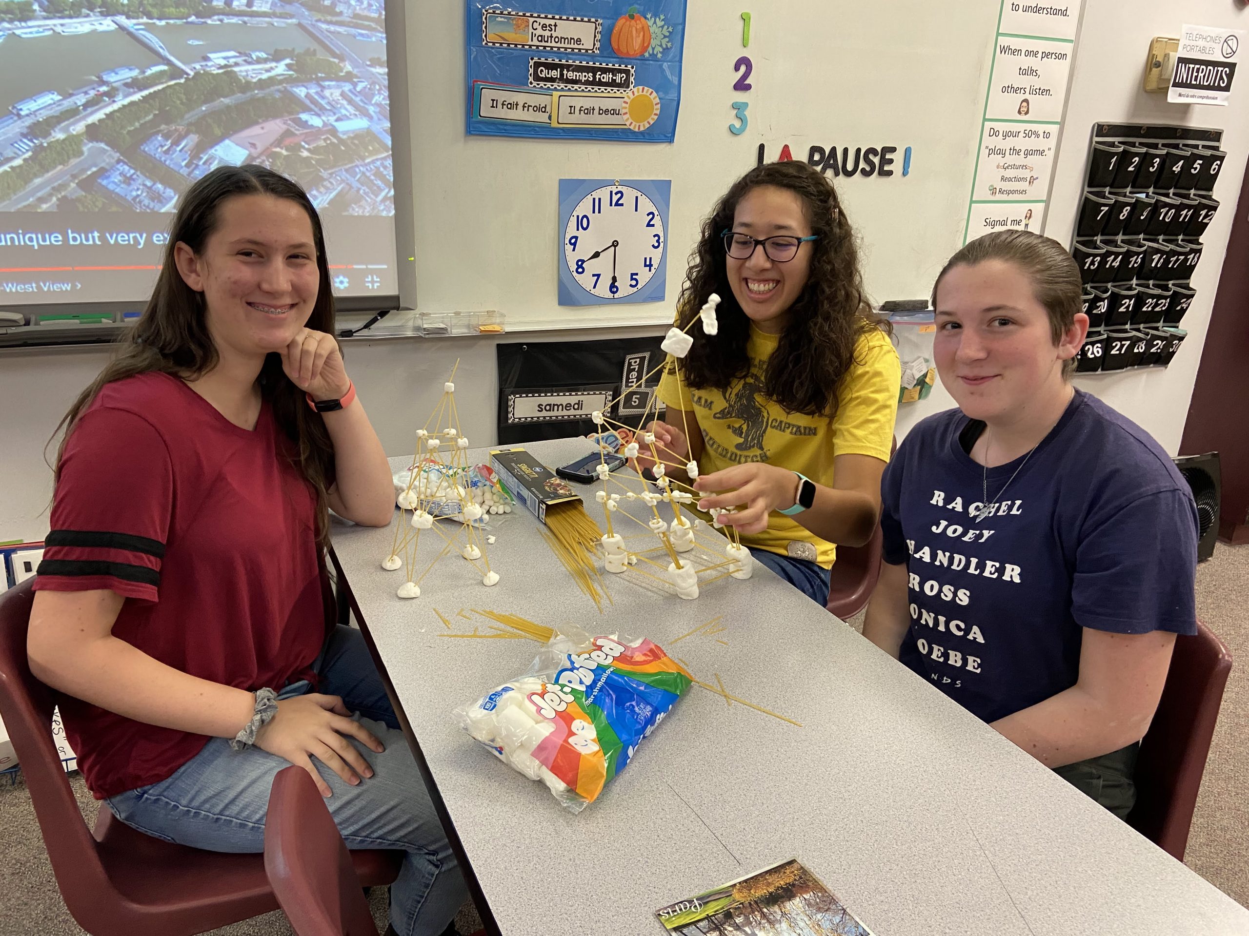 Students making large Eiffel Tower