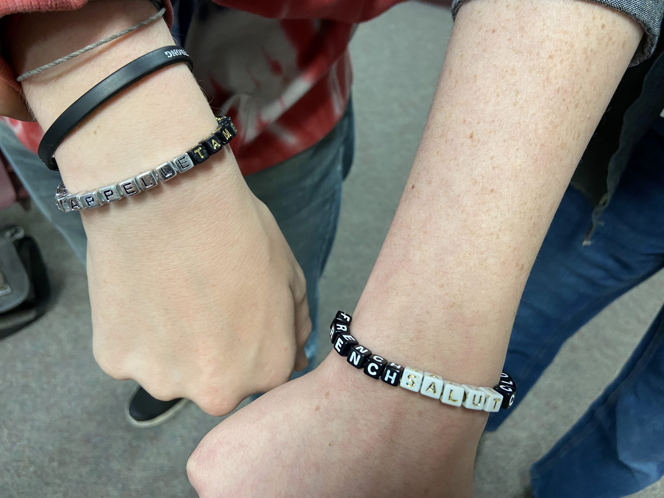 bracelets on students arms